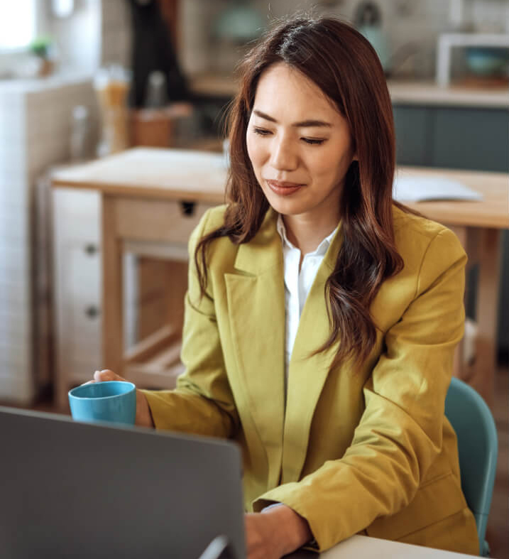 Image of a person working on a computer